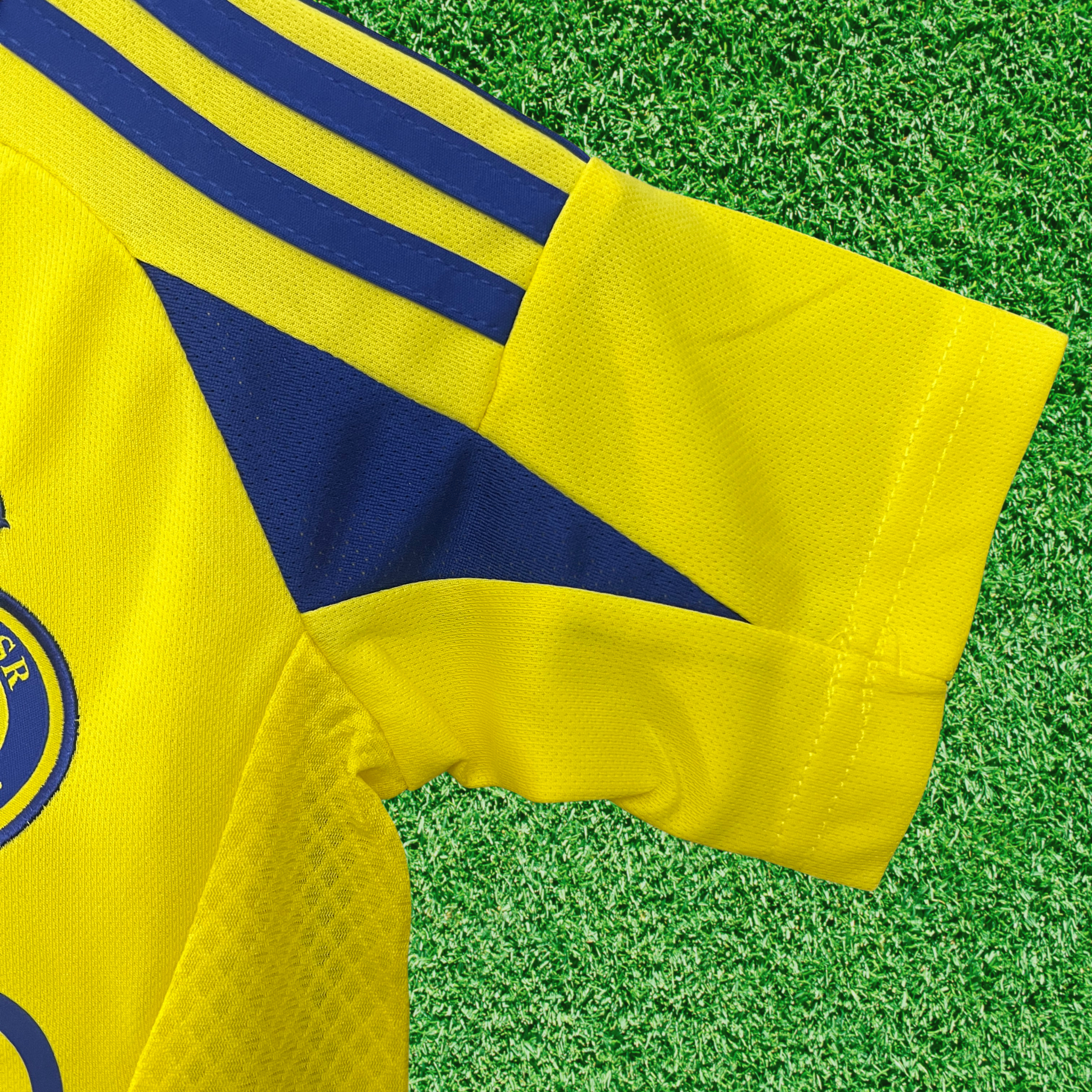 Kit Al-Nassr FC I 24/25 Infantil