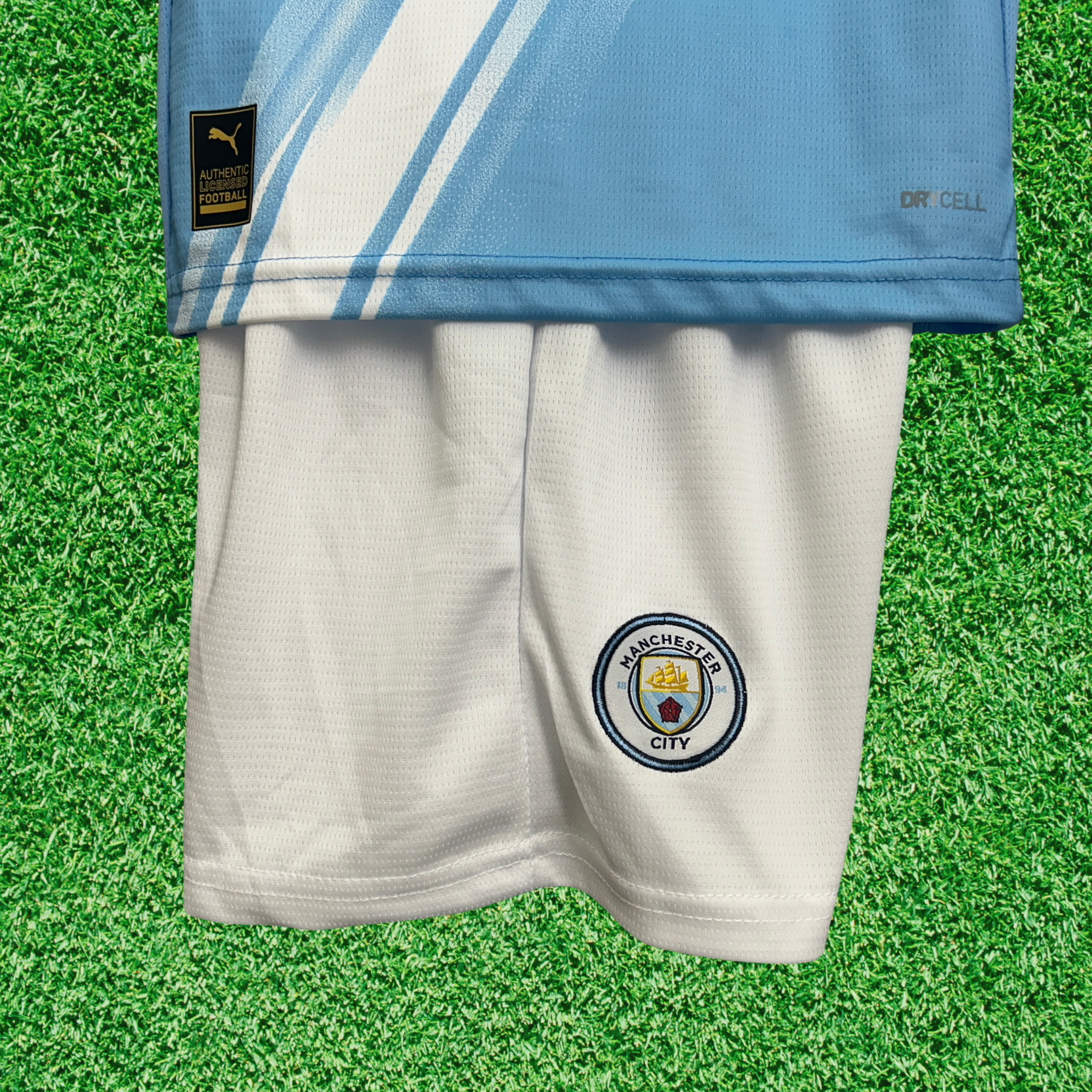 Kit Manchester City I 25/26 Infantil